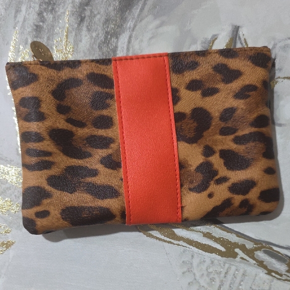 ipsy Handbags - Ipsy Leopard Print Cosmetic Bag with Red Accent